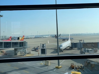 Airport tarmac view through terminal window