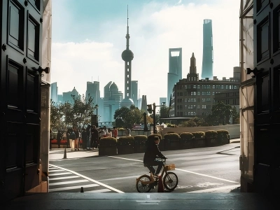 Shanghai Lujiazui skyline framed by old city gate