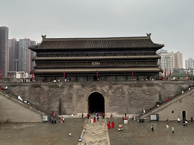 Xi'an Ancient City Wall gate with historic ramparts and modern city buildings Xi'an Ancient City Wall gate with historic ramparts and modern city buildings