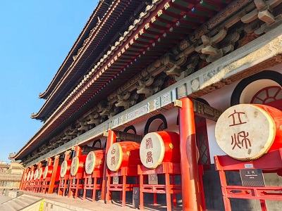 Xi'an Bell Tower with traditional red lanterns and ornate wooden architecture. Xi'an Bell Tower with traditional red lanterns and ornate wooden architecture.