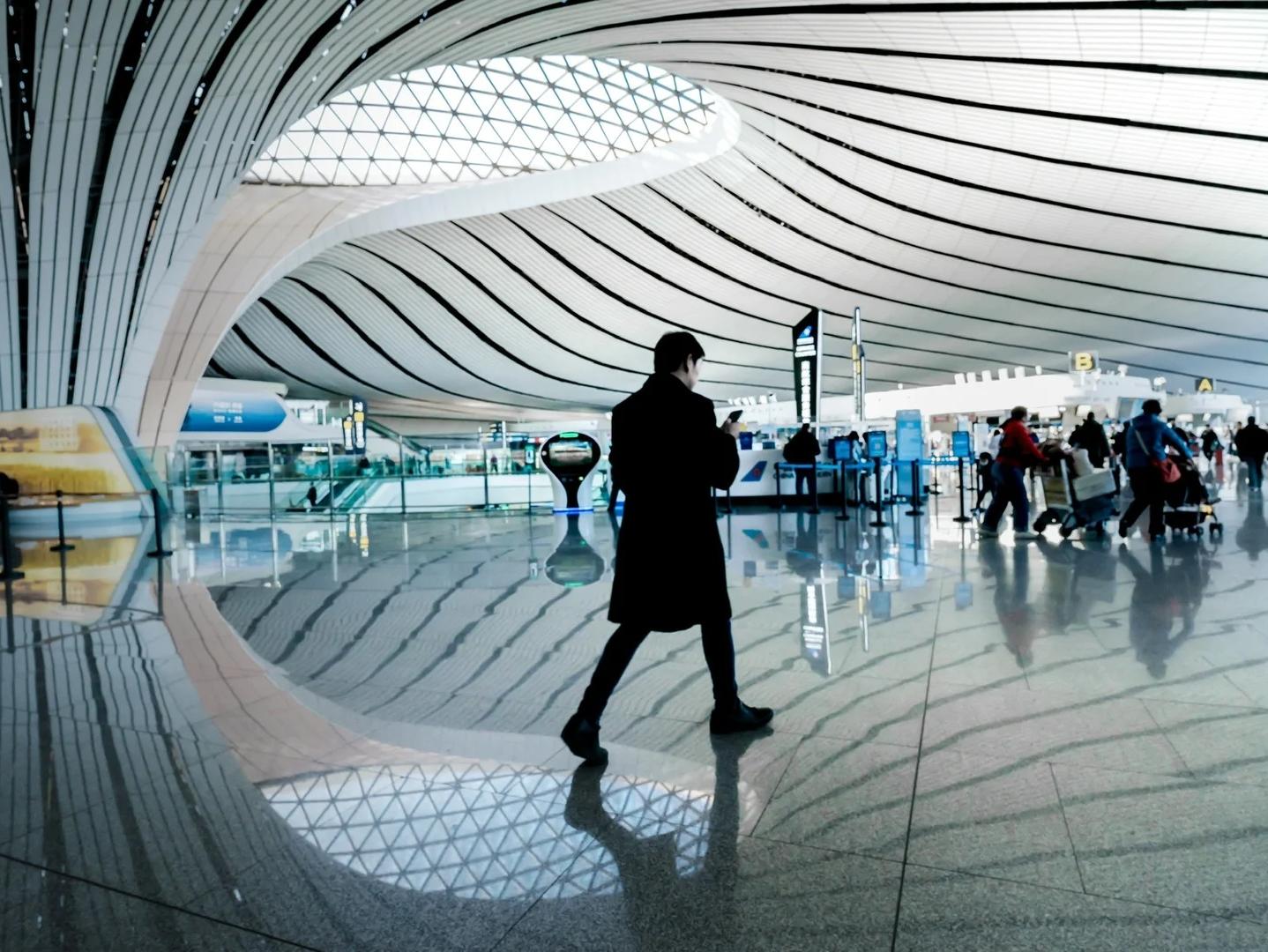 Passenger Silhouette Inside Beijing Daxing International Airport Terminal