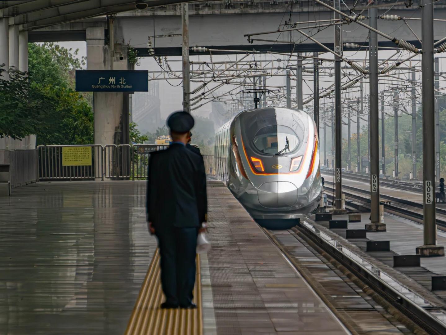 Fuxing High?Speed Train Arriving at Guangzhou North Station Platform Fuxing High?Speed Train Arriving at Guangzhou North Station Platform