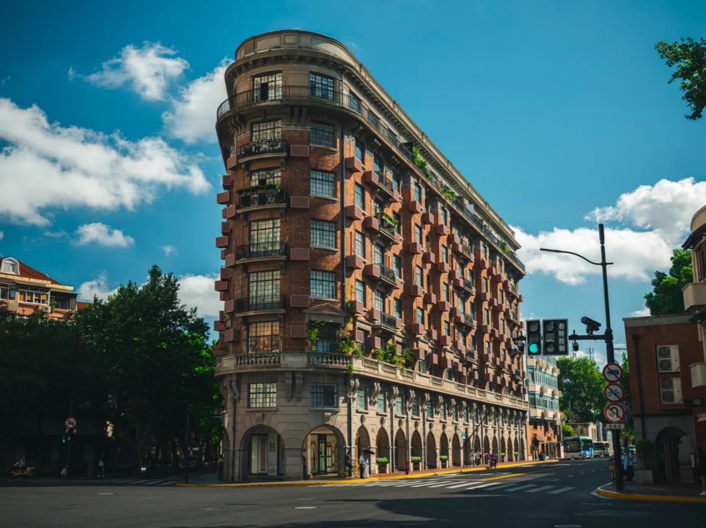 Famous wedge?shaped Wukang Building under sunny sky