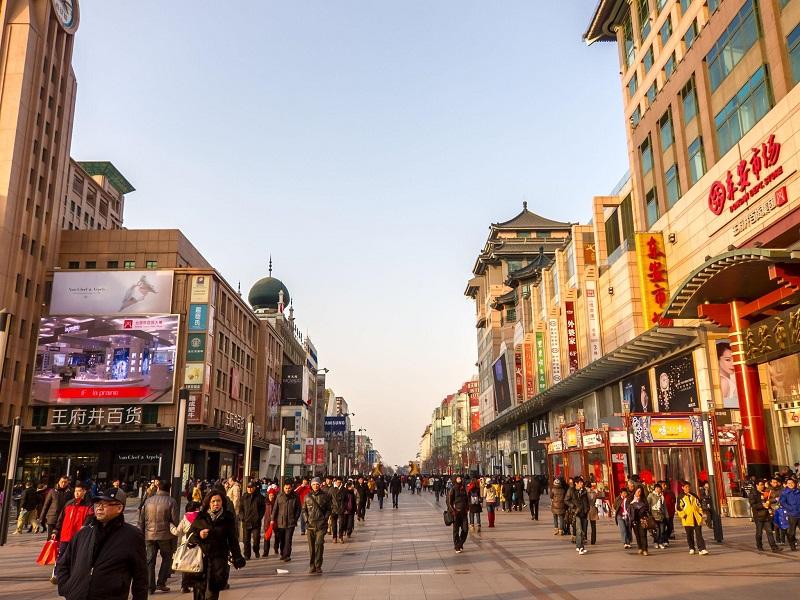 Busy Wangfujing pedestrian shopping street in Beijing daytime