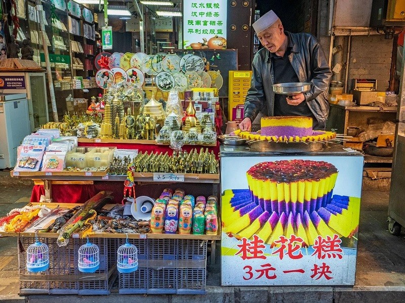 Osmanthus cake vendor at Xi'an Muslim market Osmanthus cake vendor at Xi'an Muslim market