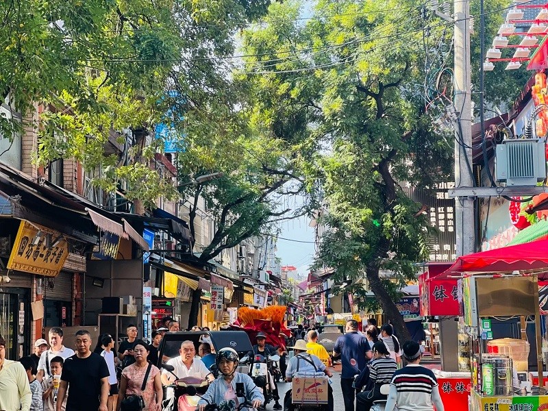 Bustling summer street scene in old Xi'an town