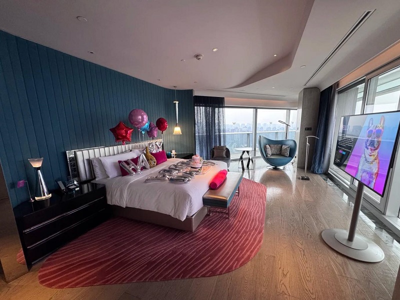 Festive W Xi'an hotel suite bedroom with celebration decor